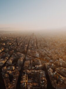 Aerial view of a tall modern city skyline, Darklab Nimbus urban concept