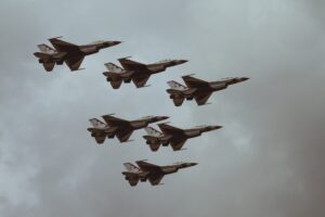 Six aircraft flying in tight formation, Darklab Sentinel defence patrol